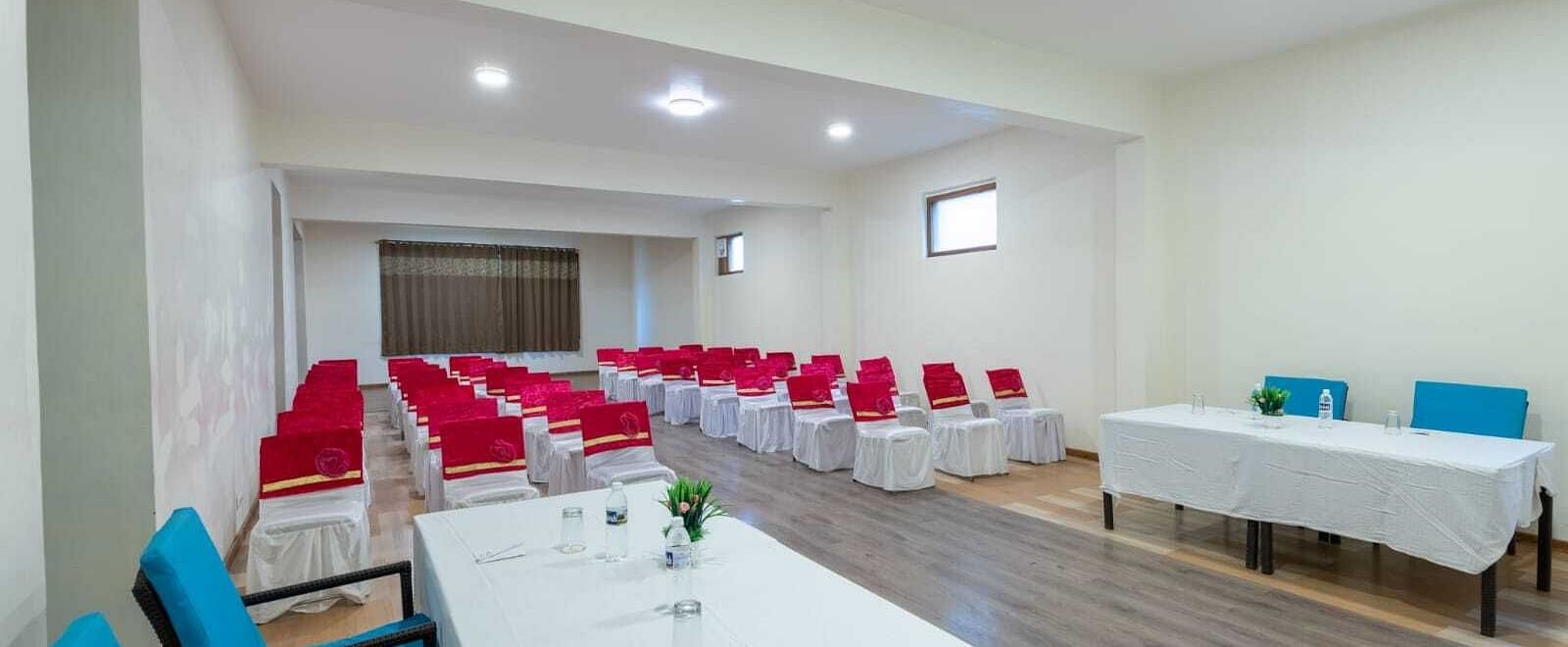 A shot of conference room with rows of chairs set up for a meeting or presentation  | DLS Serenity Resort and Spa